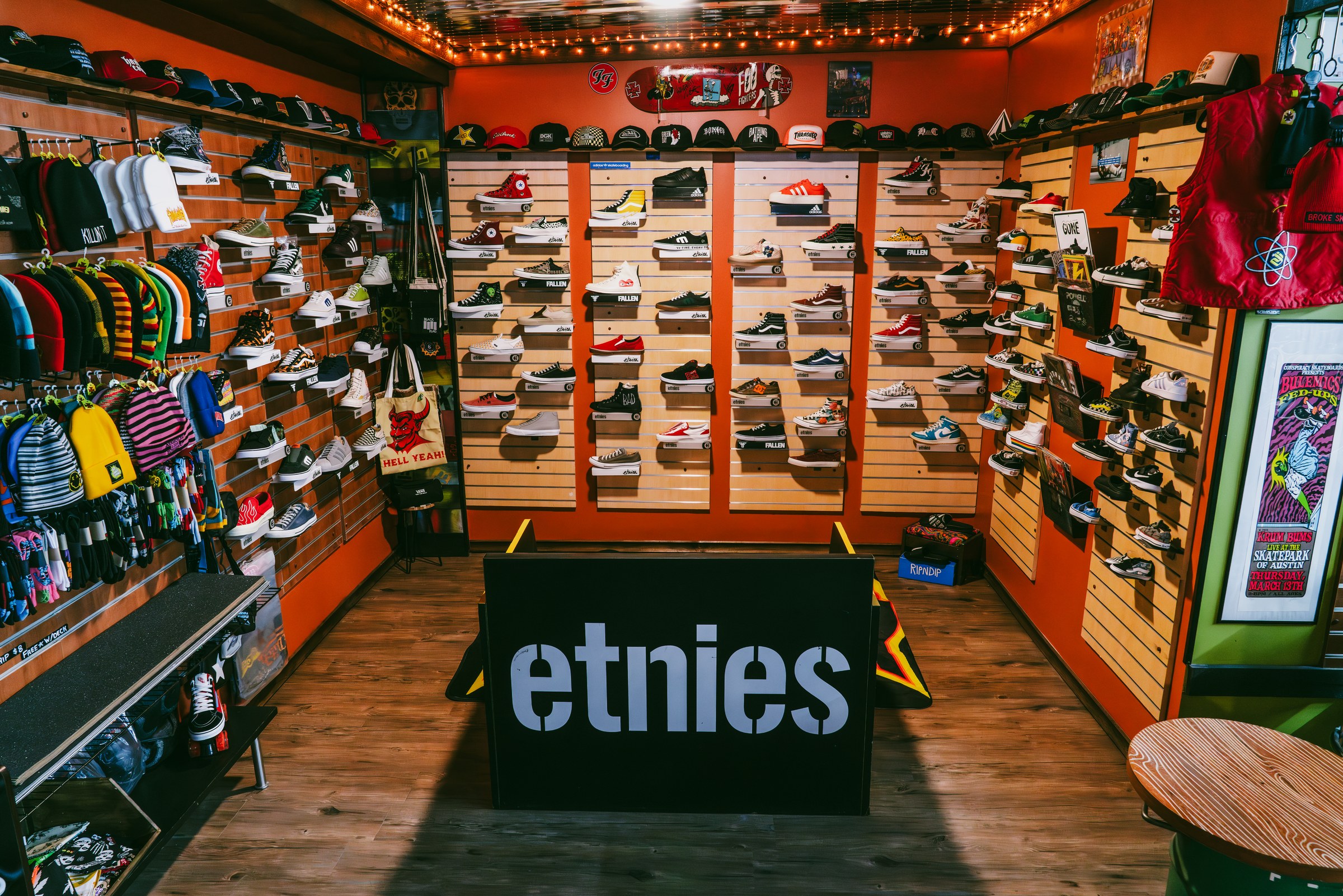 The shoe wall at Broke Sk8 with rows of skate shoes
